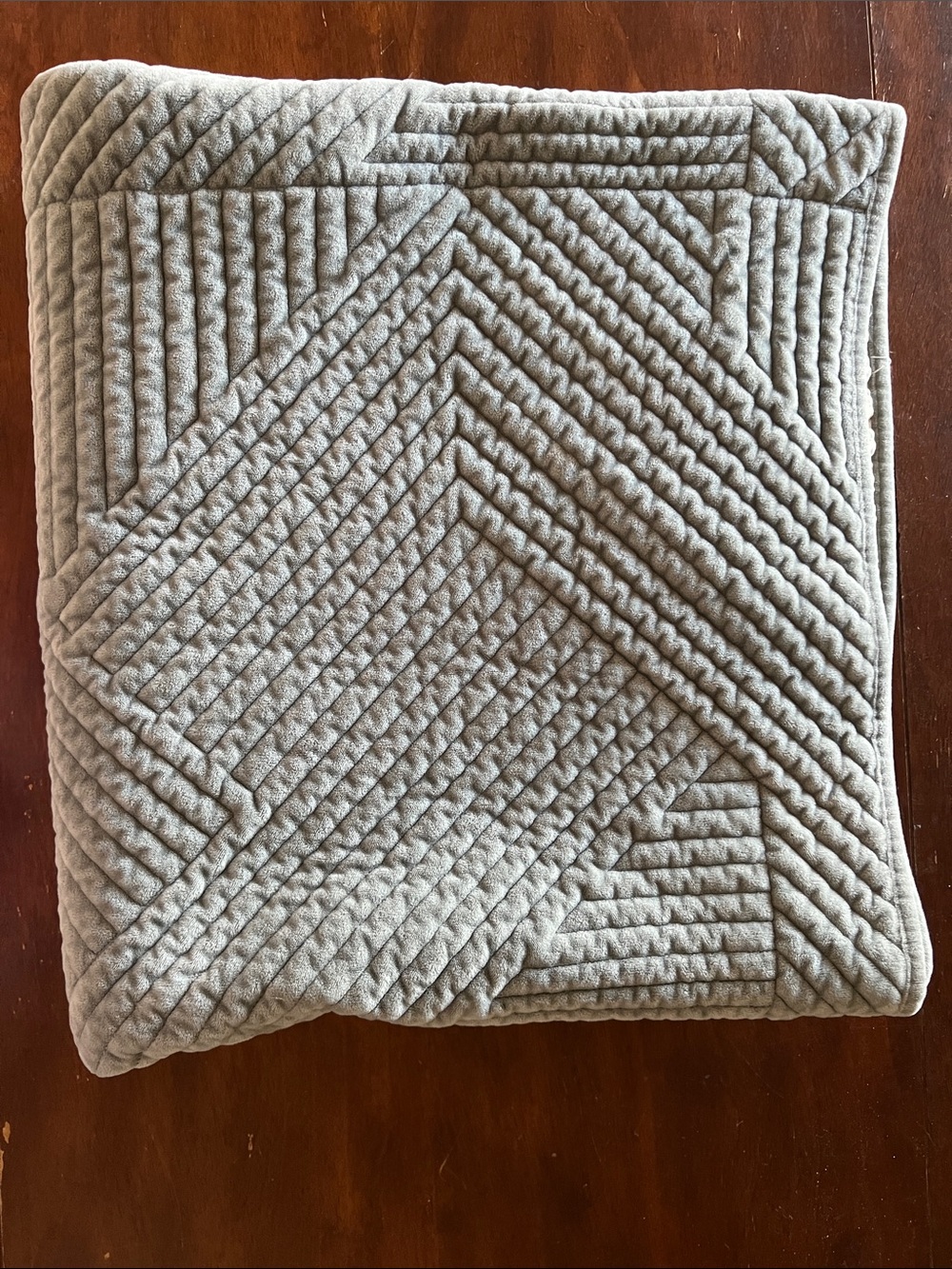 Soft Quilted Home couch cover with gripes to hold in place.     medium Gray
